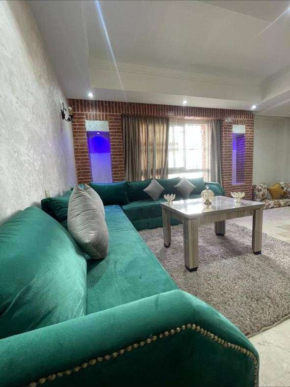 Appartement 1 chambre, salon vert